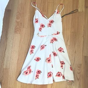 White floral dress with crossed back.